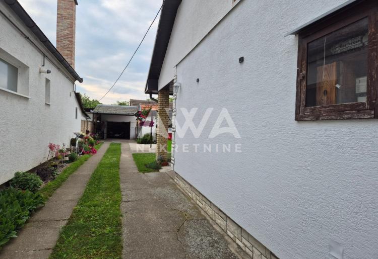 Porodična kuća 113m² + pomoćni stan 60m², plac 9 ari 